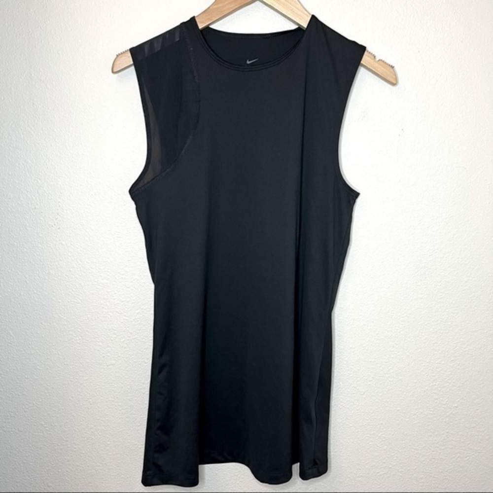Nike workout top. One sleeve mesh. Size M